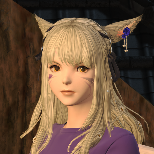 Miqo'te woman with long silver hair and a dark purple t-shirt.